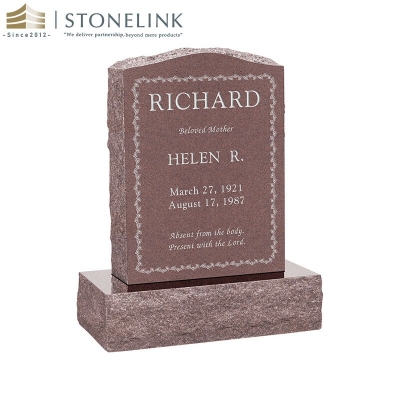 Upright multicolored granite gravestone