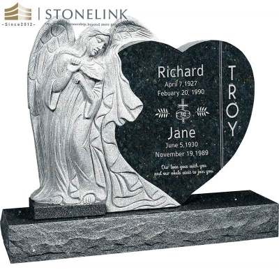 Leaning angel heart-shaped granite headstone