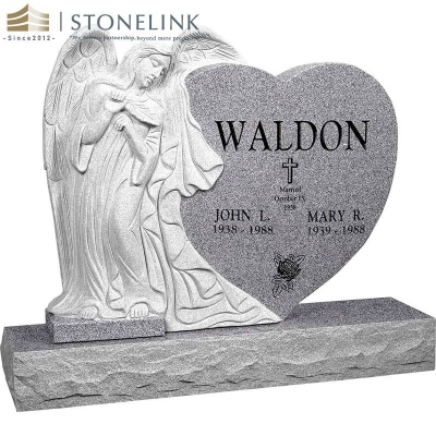 Leaning angel heart-shaped granite headstone